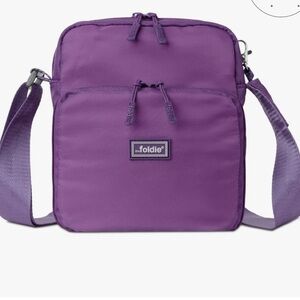 Brand new The Foldie Sling Bag in Purple